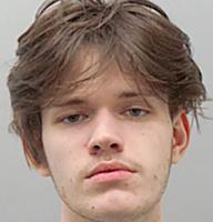 Fenton-area man charged in triple shooting