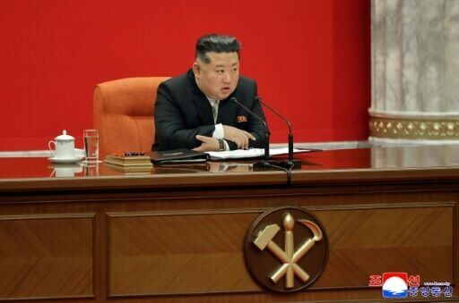 North Korean leader Kim Jong Un addresses the Workers' Party congress in photos released by state media on Tuesday.