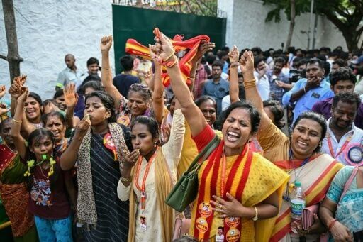 Supporters and members of Indian actor C. Joseph Vijay's Tamilaga Vettri Kazhagam party celebrate after TVK leads in Tamil Nadu Legislative Assembly elections