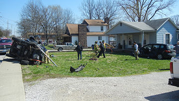 An SUV landed on its side after crashing into a minivan, sending it into a yard on North Fifth Street in Festus.
