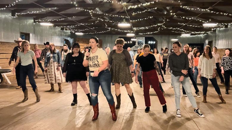 Stacey Schwartz holds weekly line dancing lessons at Brookdale Farms near Eureka.