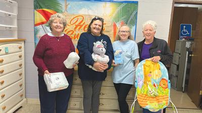 From left, volunteers Cindy Mitchell, Carol Murray, Jennifer Gill and Jill Malan.