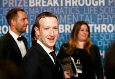 Meta co-founder and chief executive Mark Zuckerberg (C) has made the quest for 'superintelligence' a priorty for the tech giant