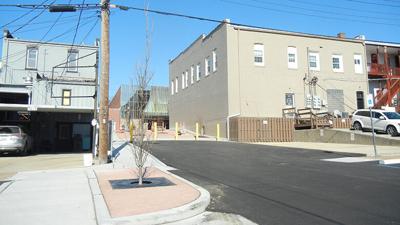 Behring Street, which connected the parking lot to Main Street, was closed to vehicle traffic as part of the renovation project.