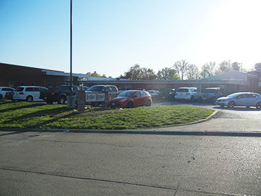 Cars parked around Festus Manor where a prayer gather was held that the Health Department says violated the county stay-at-home order.