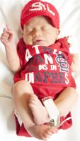St. Anthony’s gives newborns Cards caps during World Series