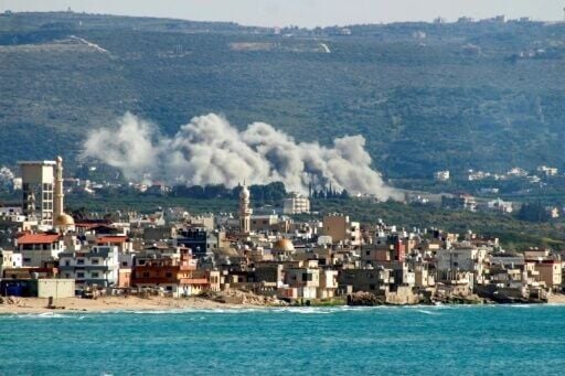Smoke rises from the site of an Israeli airstrike on the Lebanese village of Qlaileh