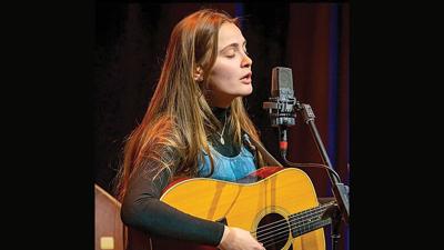 Audrey Neel performs solo on guitar and vocals.