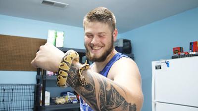 Sawyer Largent and his pet snake, Onyx