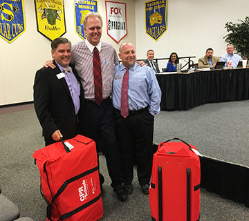 George Weber Chevrolet donates CPR kits to the Fox School District.