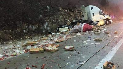 Tractor-trailer wrecks on I-44, spilling a load of berries.