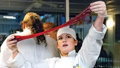 Ashley Tindle demonstrates candy making