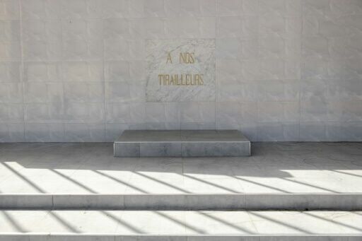 A tribute to the slain riflemen or 'tirailleurs' is seen at the Thiaroye military cemetery outside of Dakar