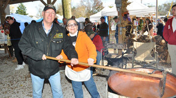 Poitrases stir apple butter