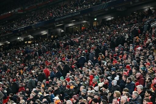 Liverpool fans leave Anfield before the final whistle during their 4-1 defeat by PSV Eindhoven
