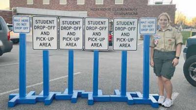 Amalia Phye oversaw her Eagle Scout project to make posts for traffic signs guiding parents for drop-offs and pick-ups at High Ridge Elementary.