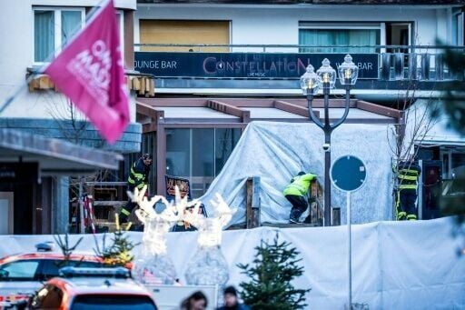 Rescuers and fire-fighters working at Le Constellation bar in Crans-Montana