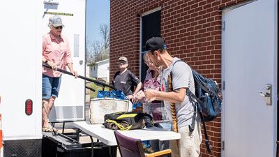 Matt Herring drops his clothes off for the laundry service at the First Baptist Church of Festus and Crystal City, 107 N. Truman Blvd., Crystal City.