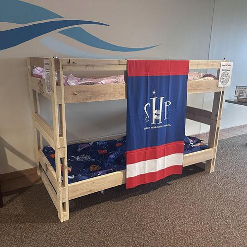 The Sleep in Heavenly Peace Eureka Chapter builds and donates children’s bunk beds.