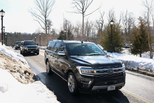 The motorcade believed to be carrying former US Secretary of State Hillary Clinton makes its way toward the Chappaqua Performing Arts Center