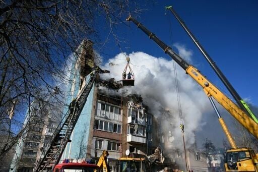 A Russian attack on the city of Ternopil tore a residential building apart and left many dead
