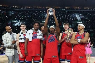 Members of Team Vince celebrate after winning the Rising Stars Challenge Championship Game during NBA All-Star Weekend