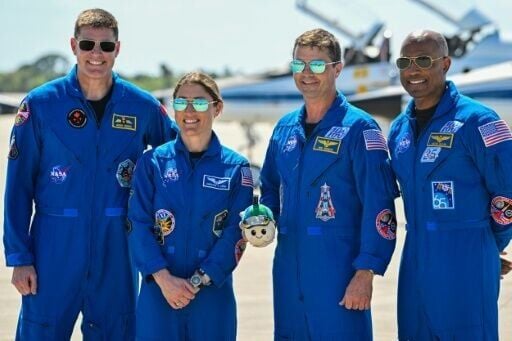 (L-R) Canadian Space Agency astronaut Jeremy Hansen along with NASA astronauts Christina Koch, Reid Wiseman and Victor Glover