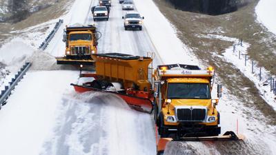 snow plows on roads