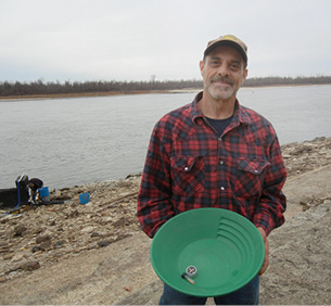 Members of Gold Prospector club practice their skills, seeking gold along Mississippi River at Herculaneum 