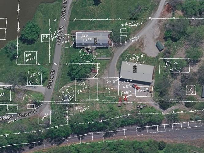 The farm’s original map is laid over an aerial view of Crites Park, which shows the red barn, at the top center, still standing.