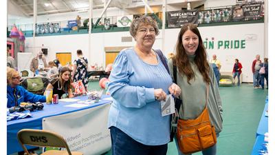 Kaye Propst and her daughter, Kami, of De Soto shop at the Home Show.
