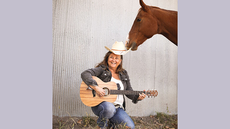 Eureka musician Melissa Corbett with her horse, Dollar.