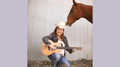 Eureka musician Melissa Corbett with her horse, Dollar.