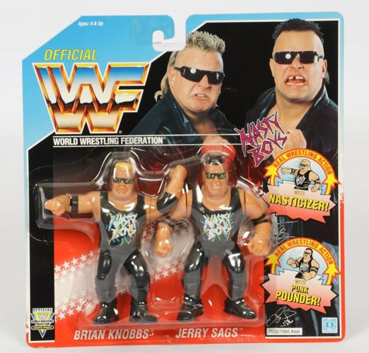 WWF wrestling figures from the 1990s fetch thousands of pounds at auction