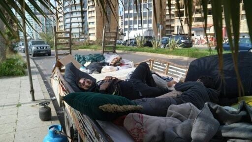 Lebanese displaced by Israeli bombardment sleep in Beirut's streets