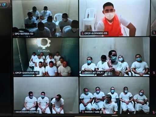 This handout image released by El Salvador's Attorney General's Office on April 1, 2026, shows a mass trial of alleged gang members held over video call
