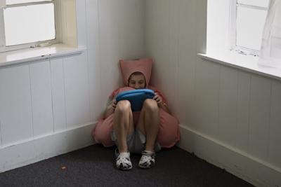 Some parents call tablets the 'square au pair.' Danielle Villasana/The Washington Post via Getty Images