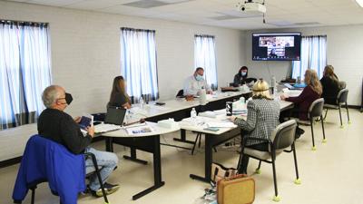 Health Department staff members and trustees at the board's Jan. 27 meeting