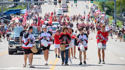 The Fox Warriors hockey team walks down Jeffco Boulevard during the Arnold Days parade on Sept. 20.