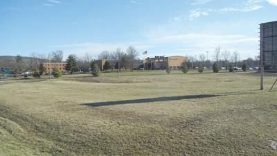 A 3.63-acre plot next to St. Pius X High School has been rezoned to pave the way for a ballfield to be built.