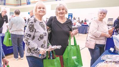 Regina Bowden of House Springs, left, and Rita Williams of Imperial visit vendor tables at the 2022 Eureka Senior Expo.