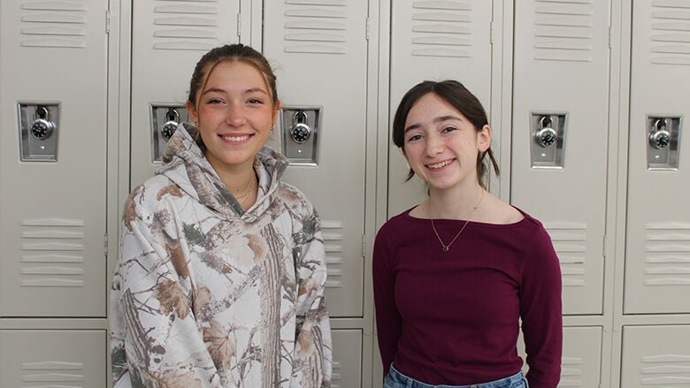 Eureka High School sophomore Ady Vessells, left, and senior Kate Feeney won first place in separate categories for this year’s “I Voted” sticker design contest.