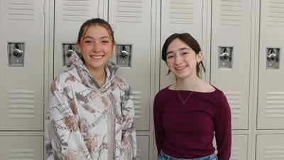 Eureka High School sophomore Ady Vessells, left, and senior Kate Feeney won first place in separate categories for this year’s “I Voted” sticker design contest.