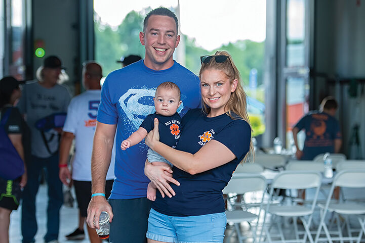 Drew and Brittney Moore celebrate Big River Ambulance District’s 50th anniversary with Vincent, 5 months.