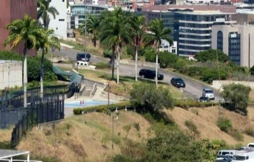Vehicles left the US embassy in Caracas during discussions about restoring diplomatic ties between the two countries