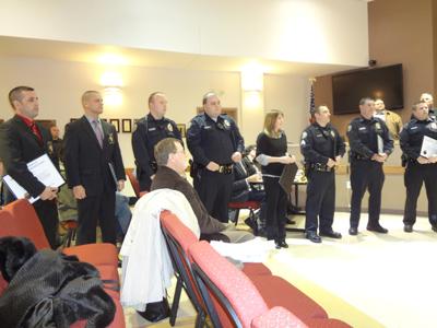 Counts honors Arnold cops, dispatcher