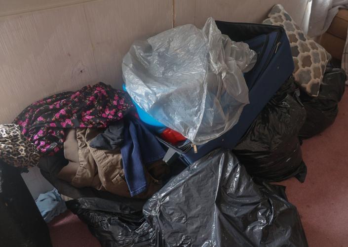 Bags fill Victorino Martin-Chavez's home in Milan