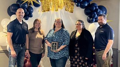 Employees from Bank Star accept the award for Business of the Year at the Hillsboro Chamber of Commerce awards luncheon on Feb. 27.