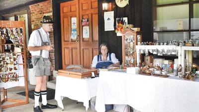 Gerard and Martha Schellin of House Springs sell German antiques at their booth.