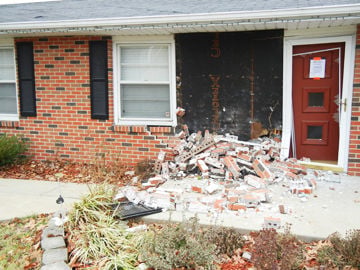 Pickup slams into Festus home